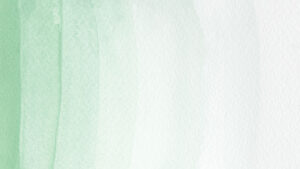 Soft green watercolor wash across a white, textured paper background, creating an abstract background.